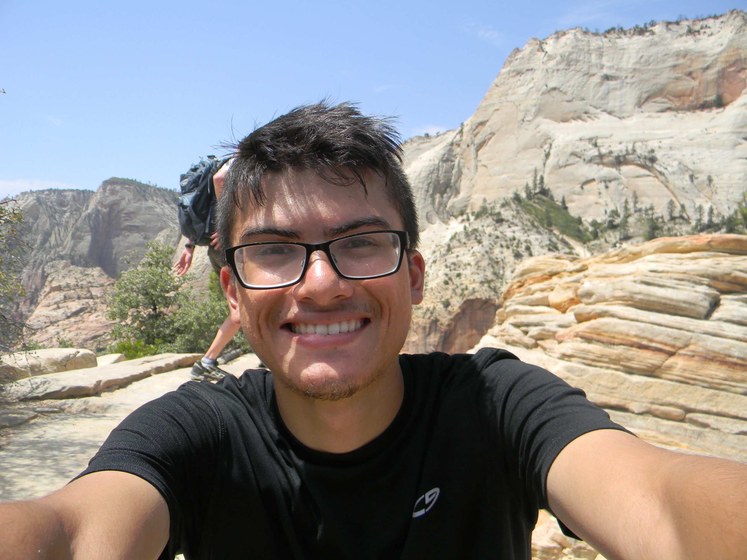 Photo of Cameron on top of Angel's Landing. Zion National Park.