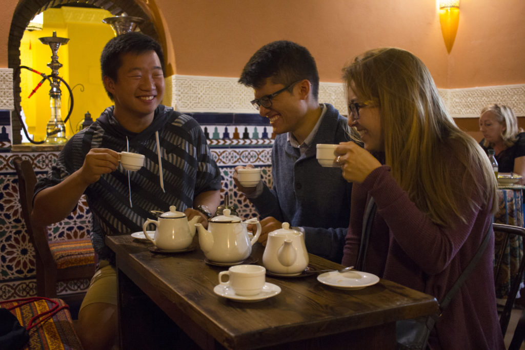 Cameron having tea with friends in a tea house in Granada, Spain
